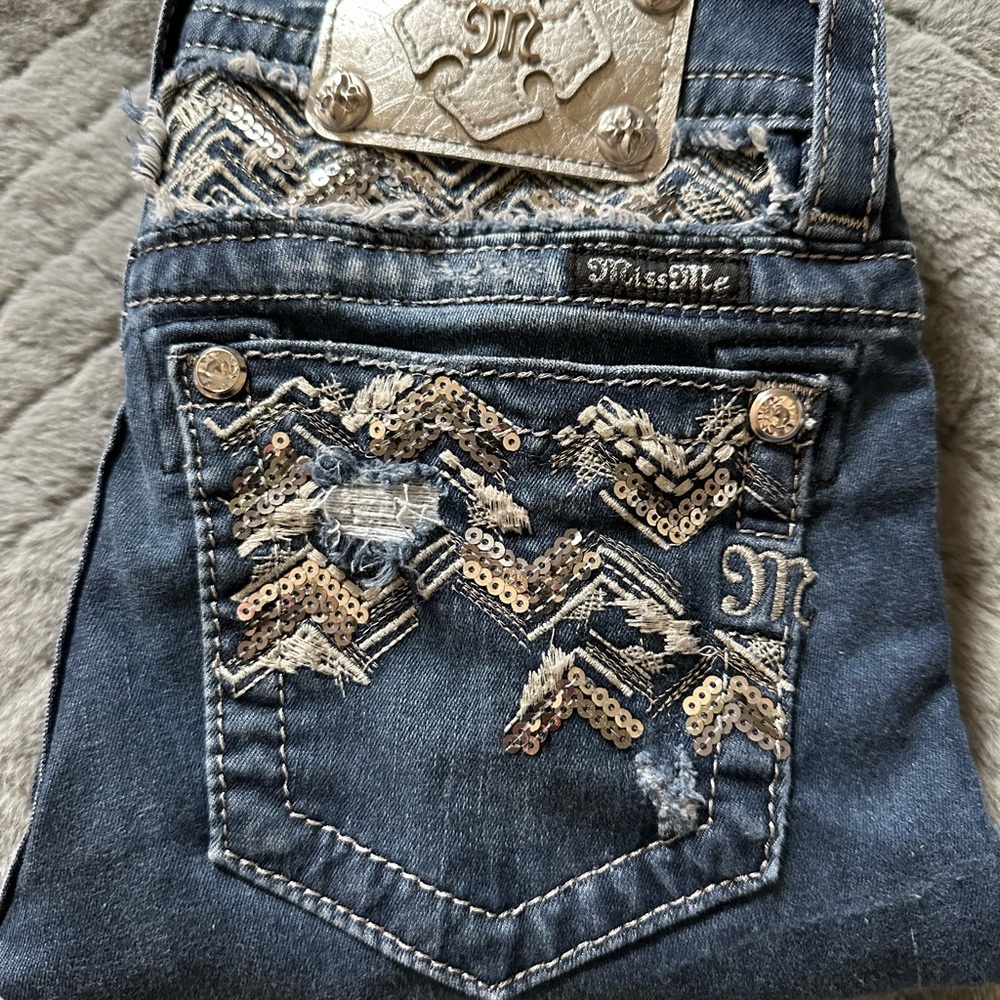**sold in garage sale** Miss Me skinny jeans